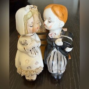 Kissing Bride and Groom sitting on a Bench Salt and Pepper Shaker Set